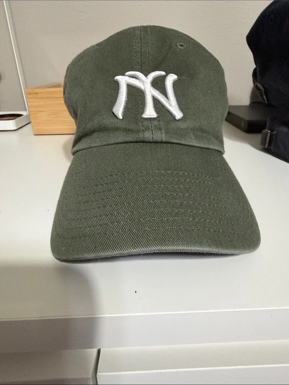 Olive Green NY Baseball Cap with White Embroidered Logo